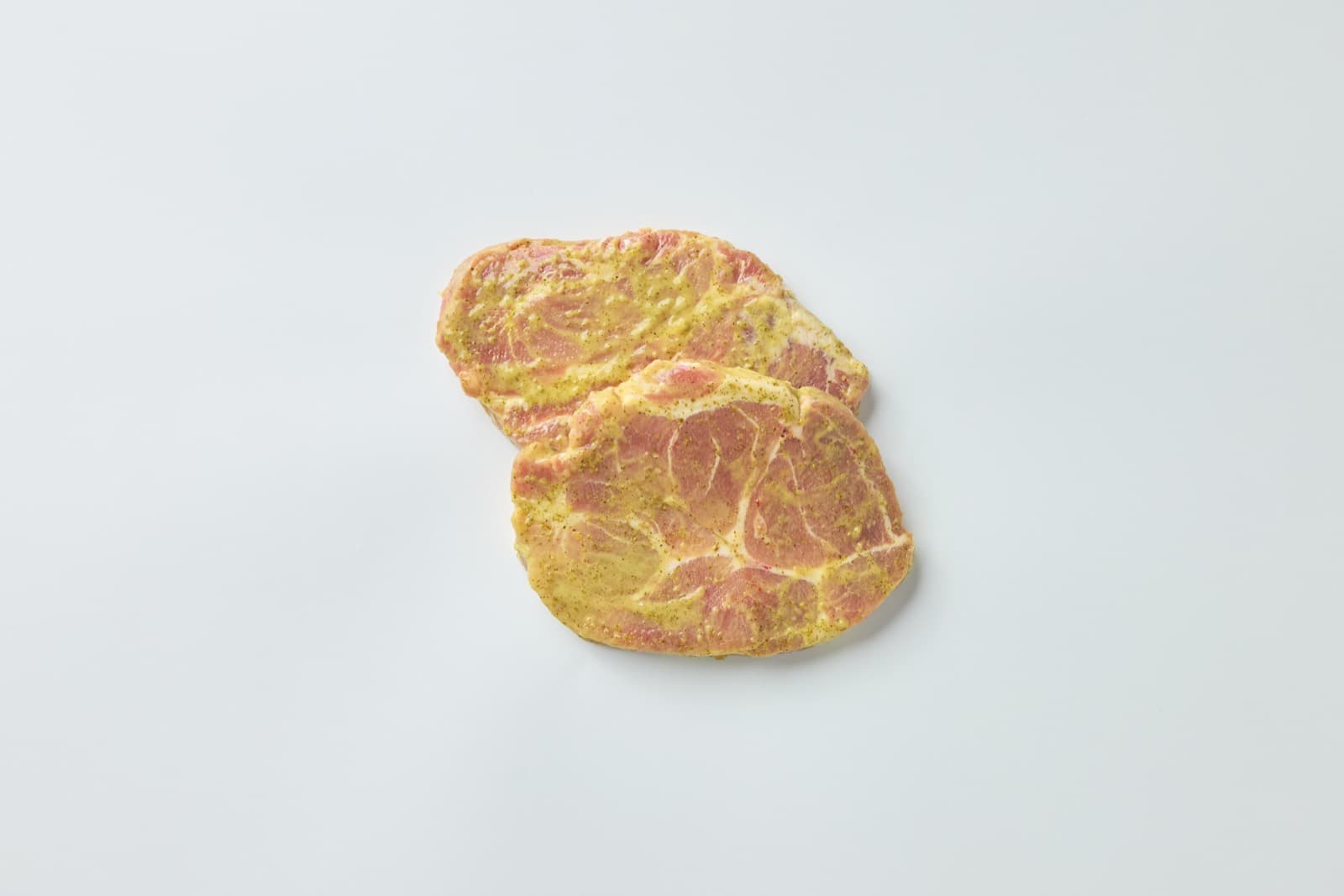 Grillnackensteaks Kräuterbutter, mariniert